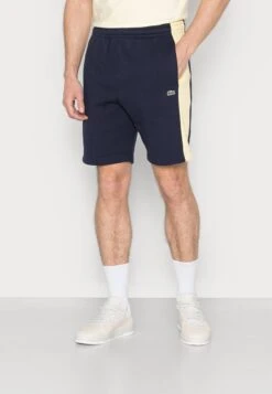 Lacoste UNISEX - Jogginghose - Marine/jaune