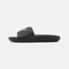 Lacoste CROCO SLIDE - Pantolette Flach - Black 1 Lacoste CROCO SLIDE - Pantolette Flach - Black -Lacoste 180589bdddd0490f811df33a199d0b99