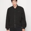 Lacoste Bomberjacke - Noir 2 Lacoste Bomberjacke - Noir -Lacoste 249c835e5b42430f946467ddbff8efe8
