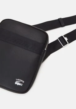 LACOSTE PRACTICE S CAMERA BAG UNISEX - Umhängetasche - Noir -Lacoste 48b05c114ad346ffb6a9eaa4a4ce7345