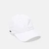 Lacoste UNISEX - Cap - White -Lacoste b56ce5e3c3a340c0afde2a58769a86e7