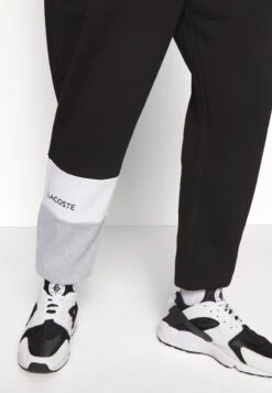 Lacoste Jogginghose - Noir/blanc 13 Lacoste Jogginghose - Noir/blanc -Lacoste b9af72e53f5c40e9b7af72ba3a2cfa68