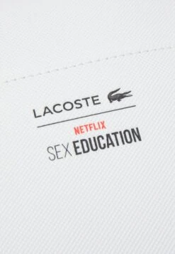 LACOSTE X NETFLIX UNISEX - Umhängetasche - White -Lacoste d0dbd2050afd4c8fb3cf355cccc66e93