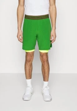Lacoste Sport TENNIS SHORT 2-IN-1 - Kurze Sporthose - Tarragon/electric Yellow